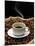 A Cup of Coffee on a Jute Sack Full of Coffee Beans-Gustavo Andrade-Mounted Photographic Print