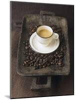 A Cup of Espresso on a Wooden Bowl with Coffee Beans-Anita Oberhauser-Mounted Photographic Print