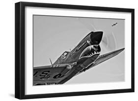 A Curtiss P-40E Warhawk in Flight Near Chino, California-null-Framed Photographic Print