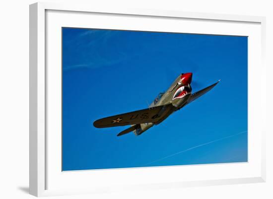 A Curtiss P-40E Warhawk in Flight Near Chino, California-null-Framed Photographic Print