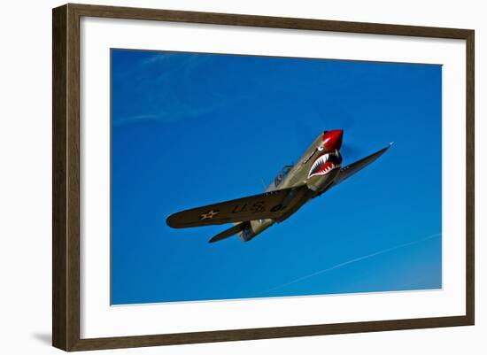 A Curtiss P-40E Warhawk in Flight Near Chino, California-null-Framed Photographic Print