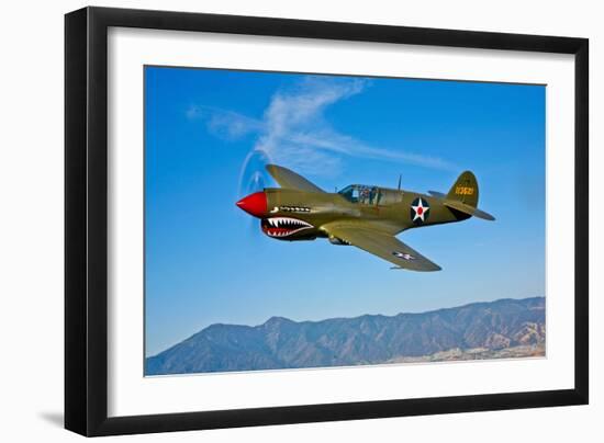 A Curtiss P-40E Warhawk in Flight Near Chino, California-null-Framed Photographic Print