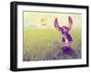 A Cute Basset Hound Chasing a Tennis Ball in a Park or Yard on the Grass Done with a Retro Vintage-graphicphoto-Framed Photographic Print