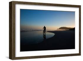 A Cyclist on Juquehy Beach at Sunset-Alex Saberi-Framed Photographic Print