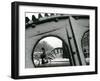 A Cyclist Passes a Draw Bridge as Snow Covers the City Center of Amsterdam-null-Framed Premium Photographic Print