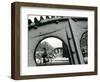 A Cyclist Passes a Draw Bridge as Snow Covers the City Center of Amsterdam-null-Framed Photographic Print