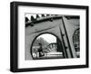 A Cyclist Passes a Draw Bridge as Snow Covers the City Center of Amsterdam-null-Framed Photographic Print