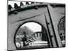 A Cyclist Passes a Draw Bridge as Snow Covers the City Center of Amsterdam-null-Mounted Photographic Print