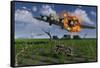 A Damaged B-17 Flying Fortress Attempting an Emergency Landing-null-Framed Stretched Canvas