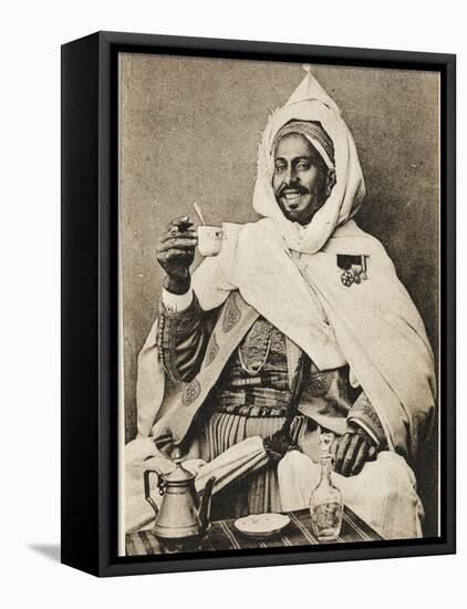 A Decorated Moroccan Tribal Chief Enjoying a Cup of Coffee-null-Framed Stretched Canvas