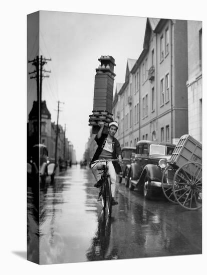 A Delivery Boy for a Tokyo Restaurant Carries a Tray of Soba Bowls-null-Stretched Canvas