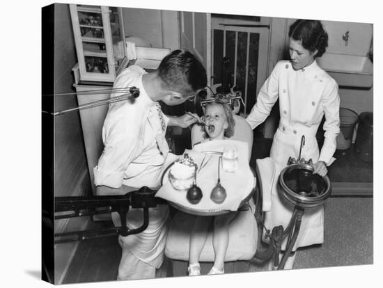 A Dentist Examining a Young Girl's Teeth in 1942-null-Stretched Canvas