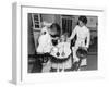 A Dentist Examining a Young Girl's Teeth in 1942-null-Framed Photo