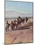 A Desert Camel Caravan - Peking to Russian Turkestan-Ella K. Maillart-Mounted Art Print