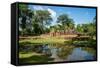 A deserted temple reflected in a lake in Siem Reap, Cambodia, Indochina, Southeast Asia, Asia-Logan Brown-Framed Stretched Canvas