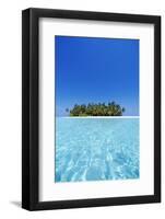 A deserted tropical island covered with palm trees amidst calm turquoise water.-Stuart Westmorland-Framed Photographic Print