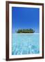 A deserted tropical island covered with palm trees amidst calm turquoise water.-Stuart Westmorland-Framed Photographic Print