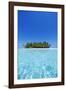 A deserted tropical island covered with palm trees amidst calm turquoise water.-Stuart Westmorland-Framed Photographic Print