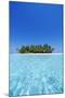 A deserted tropical island covered with palm trees amidst calm turquoise water.-Stuart Westmorland-Mounted Photographic Print