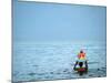 A Devotee Immerses the Idol of Elephant-Headed Hindu God Ganesh-null-Mounted Photographic Print