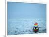 A Devotee Immerses the Idol of Elephant-Headed Hindu God Ganesh-null-Framed Photographic Print