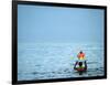 A Devotee Immerses the Idol of Elephant-Headed Hindu God Ganesh-null-Framed Photographic Print