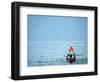 A Devotee Immerses the Idol of Elephant-Headed Hindu God Ganesh-null-Framed Photographic Print