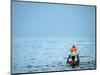 A Devotee Immerses the Idol of Elephant-Headed Hindu God Ganesh-null-Mounted Photographic Print