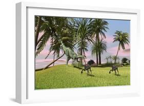 A Dilophosaurus Chasing Two Gigantoraptors across a Grassy Field-null-Framed Art Print