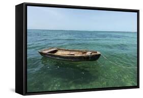 A Dingy Floats by Itself on Open Green Waters Near the Southern Coast of Cuba-James White-Framed Stretched Canvas