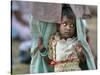 A Displaced Tamil Child Hangs to Her Father's Sarong-Gemunu Amarasinghe-Stretched Canvas