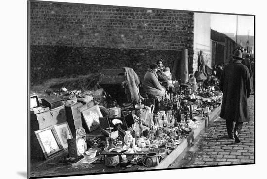 A Display of Goods at the Flea Market, Paris, 1931-Ernest Flammarion-Mounted Giclee Print