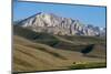 A Distant House in the Grasslands with Views of Mountains in the Distance, Bamiyan Province-Alex Treadway-Mounted Premium Photographic Print