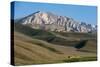 A Distant House in the Grasslands with Views of Mountains in the Distance, Bamiyan Province-Alex Treadway-Stretched Canvas