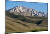 A Distant House in the Grasslands with Views of Mountains in the Distance, Bamiyan Province-Alex Treadway-Mounted Photographic Print