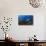 A Diver Looks on at a Lionfish Hovering Above Staghorn Coral, Indonesia-null-Photographic Print displayed on a wall