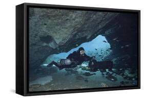 A Diver Using a Diver Propulsion Vehicle in the Blue Springs Cave System-null-Framed Stretched Canvas