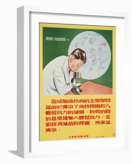 A Doctor Looks into a Microscope of Mycobacterium Tuberculosis-null-Framed Art Print