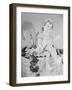 A Doll Sitting on a Wall-null-Framed Photographic Print