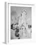 A Doll Sitting on a Wall-null-Framed Photographic Print