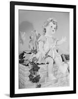 A Doll Sitting on a Wall-null-Framed Photographic Print