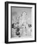 A Doll Sitting on a Wall-null-Framed Photographic Print