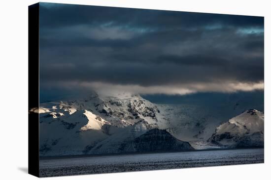 A Dramatic Sunrise over Mountains in Iceland-Alex Saberi-Stretched Canvas