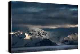A Dramatic Sunrise over Mountains in Iceland-Alex Saberi-Stretched Canvas