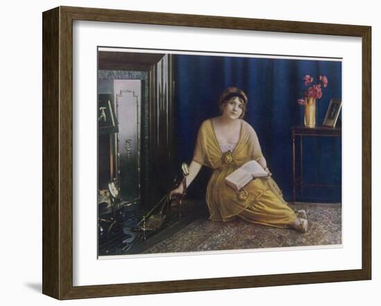 A Dreamy Young Lady Seated by the Fire with Book in Hand 'the Reverie'-null-Framed Photographic Print