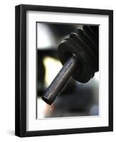 A Drip of Gas Falls from Nozzle at a Gasoline Station-null-Framed Premium Photographic Print