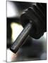 A Drip of Gas Falls from Nozzle at a Gasoline Station-null-Mounted Photographic Print