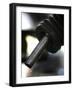 A Drip of Gas Falls from Nozzle at a Gasoline Station-null-Framed Photographic Print