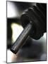 A Drip of Gas Falls from Nozzle at a Gasoline Station-null-Mounted Photographic Print