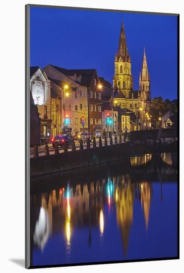 A dusk view of St. Fin Barre's Cathedral, on the banks of the Lee River, in Cork, County Cork, Muns-Nigel Hicks-Mounted Photographic Print